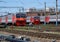 Electric trains stand in the station park