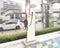 Electric Vehicle Charging Station (EV Charger), Background is blur of cars on road