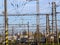 Electric wires and towers over an train station