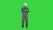 Electrical Engineer send a message with cell phone on a Green Screen, Chroma Key.