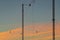 Electrical mast against the sunset sky