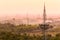 Electrical power distribution towers on misty morning