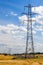 Electrical Pylon Power Lines and Traffic Queuing on a Motorway or Freeway