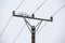 Electrical pylons high voltage wires in winter covered snow and