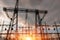 Electrical substation silhouette on the dramatic sunset background