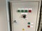 Electrical switch gear ,Digital meter at Low Voltage motor control center cabinet in coal power plant. blurred for background