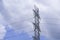 Electrical tower station wiring power with cloudy and blue sky background, High voltage station post