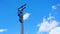 The electrician climbs onto the power line post