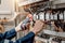 Electrician engineer uses a multimeter to test the electrical installation and power line current in an electrical system control