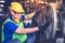 Electrician Engineers repairing machinery in industrial plants. worker Working at the Heavy Industry Manufacturing Facility