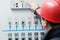 Electrician give command in power plant control center