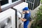 An Electrician Men Checking Air Conditioning Unit