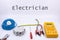 Electrician occupation electrician is written in English graphic resource with house plan and electricity equipment for electric