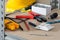 Electrician`s Tools and Supplies on Cork-Covered Shelving