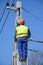 Electrician works on a pylon