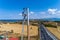 Electricians are climbing on electric poles to install and repair power lines