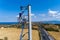 Electricians are climbing on electric poles to install and repair power lines