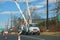 Electricians repairing wire of the power line.