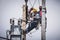 Electricians working on the electricity pole