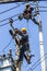 Electricians working on the electricity pole