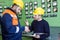 electricians with yellow helmet working in a power station