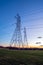 Electricity Distribution Towers and Wires at Dusk