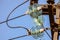 Electricity garlands close-up of insulators with electric wires