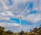 Electricity generating windmill Farms Hume Highway NSW Australia taken from moving car blurred foreground