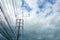 Electricity high voltage pylon and white blue sky