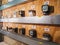 An electricity meter room. Various types of meters for taking readings.