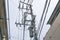 Electricity pole in Japan with power line cables against sky