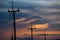 Electricity poles on colorful sky , sunset