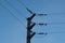 Electricity pylon against blue sky