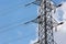 Electricity pylon on blue sky