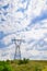 Electricity pylon on blue sky