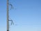 Electricity pylon, electric transmission tower, against the blue sky. Energy tower