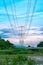 An electricity pylon is known as an overhead line pylon. high-voltage power lines at sunset.