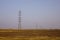 Electricity pylon towers in the desert