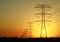 Electricity Pylons against Sunset