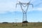 Electricity pylons in golden summer landscape. Electricity poles, Electricity posts. Energy
