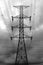 Electricity transmission pylon, High-voltage transmission tower silhouetted