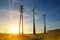 Electricity transmission pylon and wind turbines