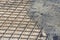 Electro-welded wire mesh for reinforcing concrete screeds in a construction site