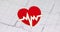 On electrocardiogram there is cardiac heart icon slow motion 4k movie