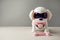 Electronic interactive toy dog puppy on a gray background, high technology concept, pet of the future, electronic home, copy space