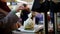 Electronic scales in the supermarket, customer - old woman - weighs the grapes in vegetable department