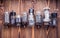 Electronic vacuum tubes on the wooden background. closeup view.