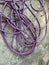 Electronics cable line in purple on floor background
