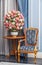 Elegance armchair with beautiful flower bouquet