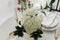 Elegance classic table setting with white dishes and gold cutlery